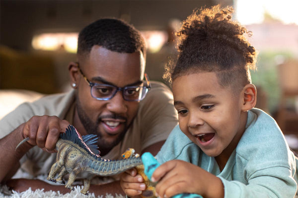 A father playing with his son.