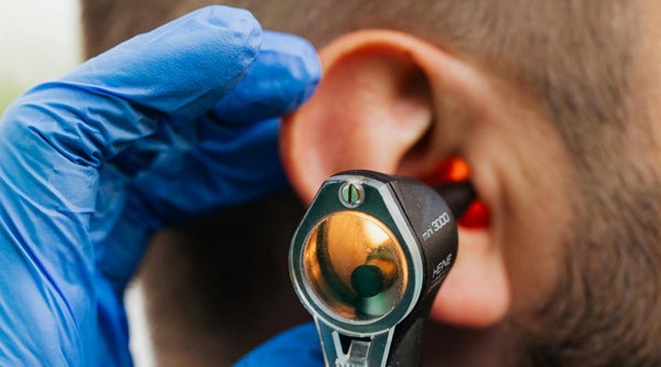 Understanding ear wax build-up: causes, symptoms & safe removal