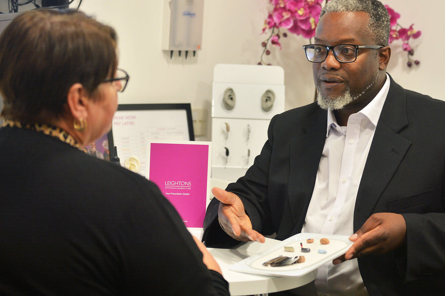 A thumbs up icon accompanied by five stars above it.