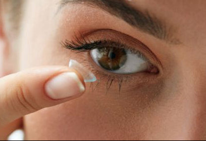 Black and white image of Leightons Opticians storefront.