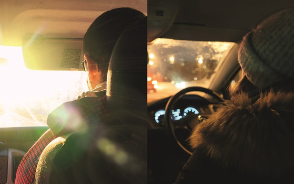Split image showing a person driving during daytime with sunlight and another person driving at night with a winter coat and beanie.