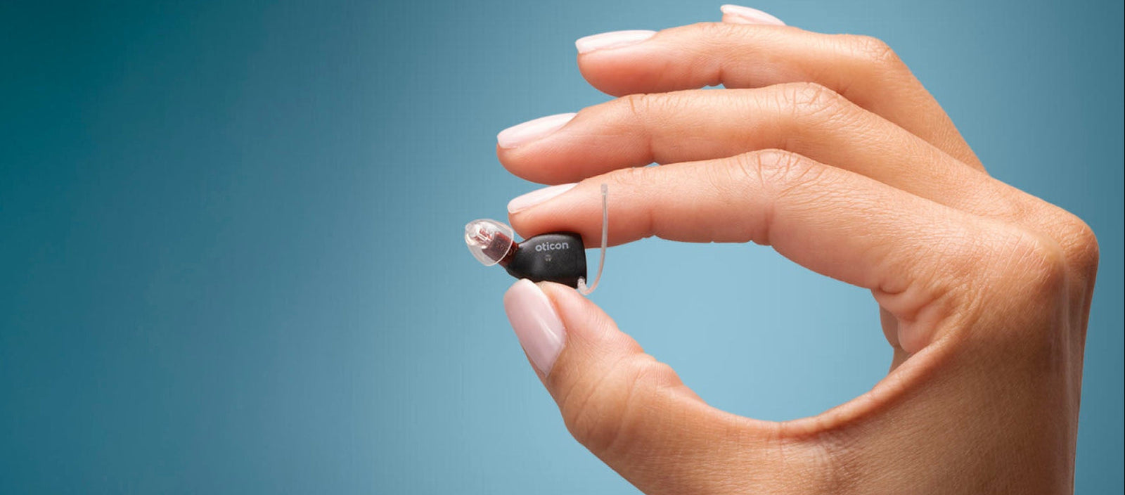 Two pairs of stylish glasses displayed on a gradient background.