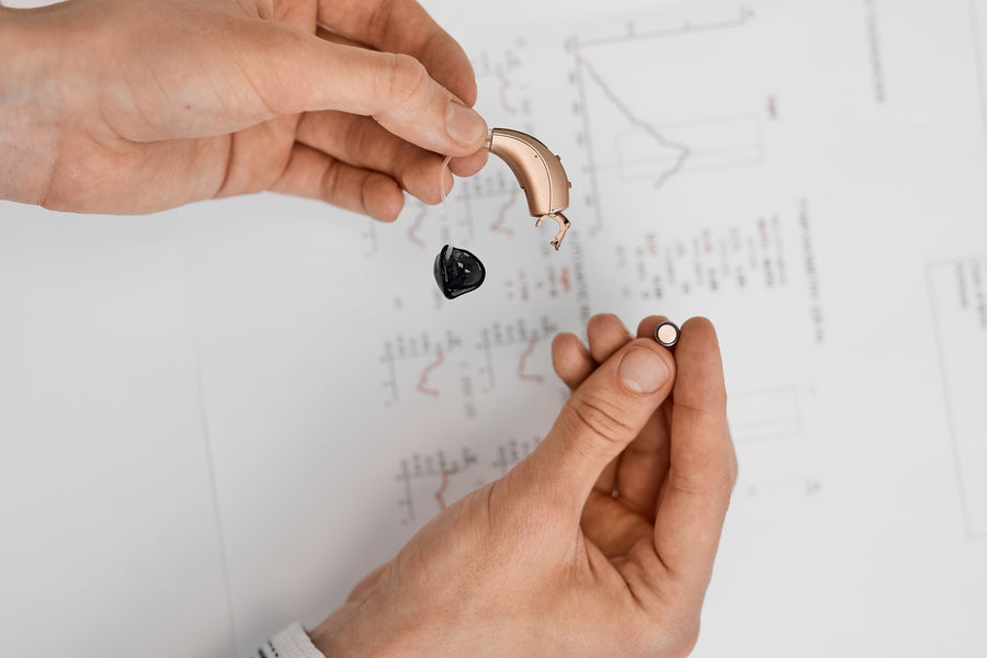 Tommy Hilfiger logo featuring a stylized flag design.