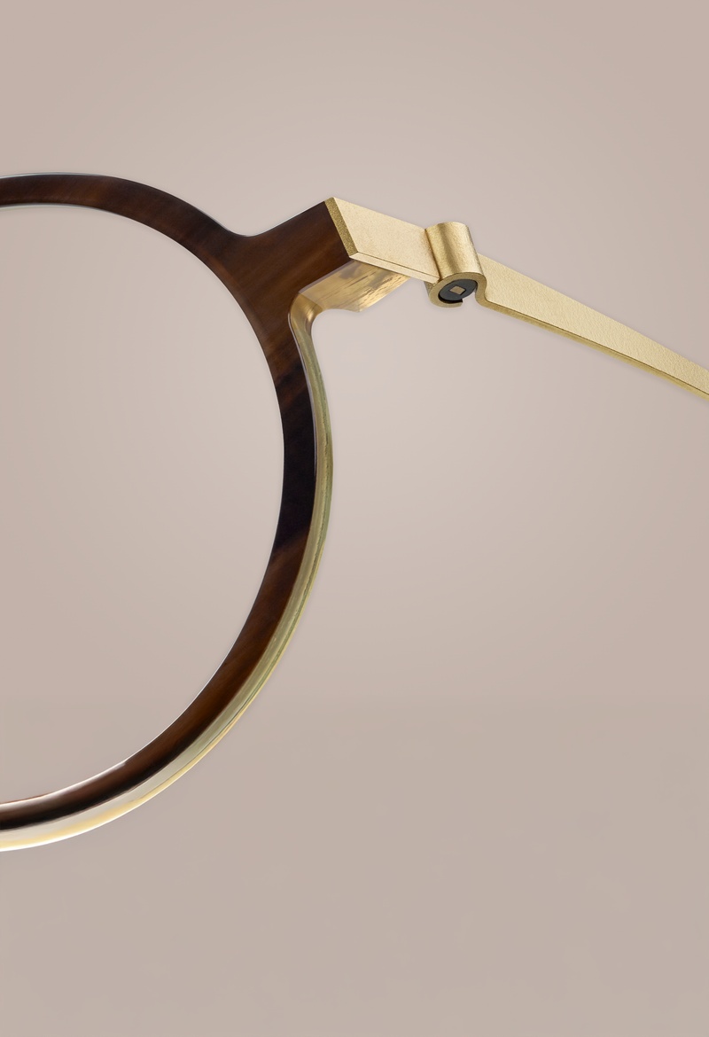 A sketched portrait of a smiling young woman with wavy hair.