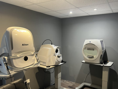 Nikon eye examination equipment in a room with other optical tools.