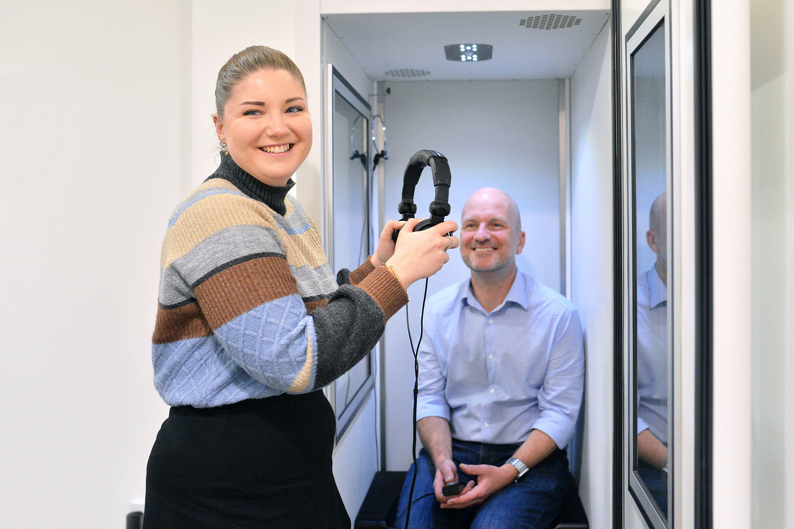 Front view of stylish tortoiseshell eyeglasses with wide frames.